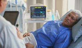 Patient Being Treated in a Hospital Bed Patient Being Treated in a Hospital Bed