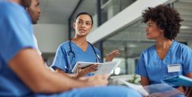 Nurses talking in a group