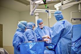 Surgeons performing surgery