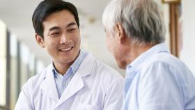 Doctor Smiling at Patient Doctor Smiling at Patient