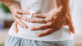 A woman with back pain