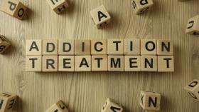 Addiction treatment Dice spelling out addiction treatment