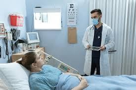 ICU Doctor talking to patient