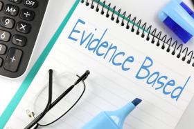 notebook with words "Evidence based" written on it 