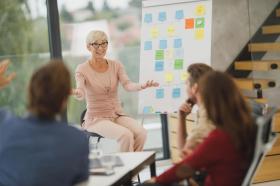 A facilitator leading a discussion A facilitator leading a discussion