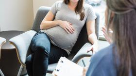 Pregnant Woman Sitting in a Chair
