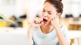 Woman Yawning