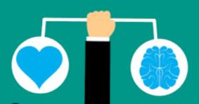 hand holding a scale with one side holding a heart and the other a brain 