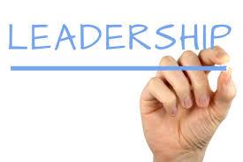 Hand writing the word Leadership 