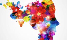 Image of Human Head with Colorful Designs Creating a Silhouette 