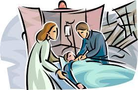 two clinicians hoovering over a patient in a patient bed 