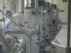 a row of 4 NICU beds a row of 4 NICU beds